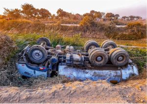 Wrecked Truck Upside Down On Roadside